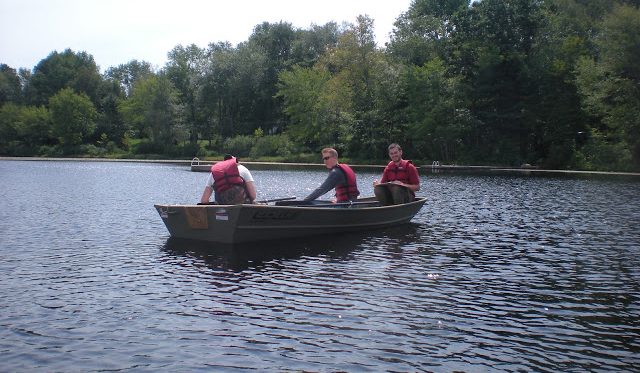 Students studying the ecology of lakes, streams and wetlands